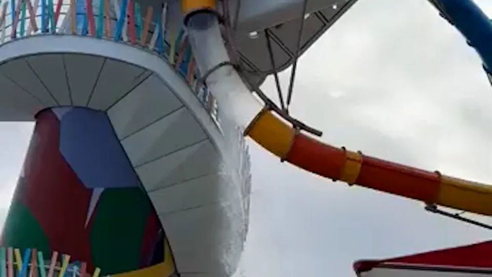 Water pours from a large opening after the slide’s acrylic panel broke