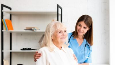 Caregiver from Integrity Home Care assisting an elderly woman at home in Springfield, MO.